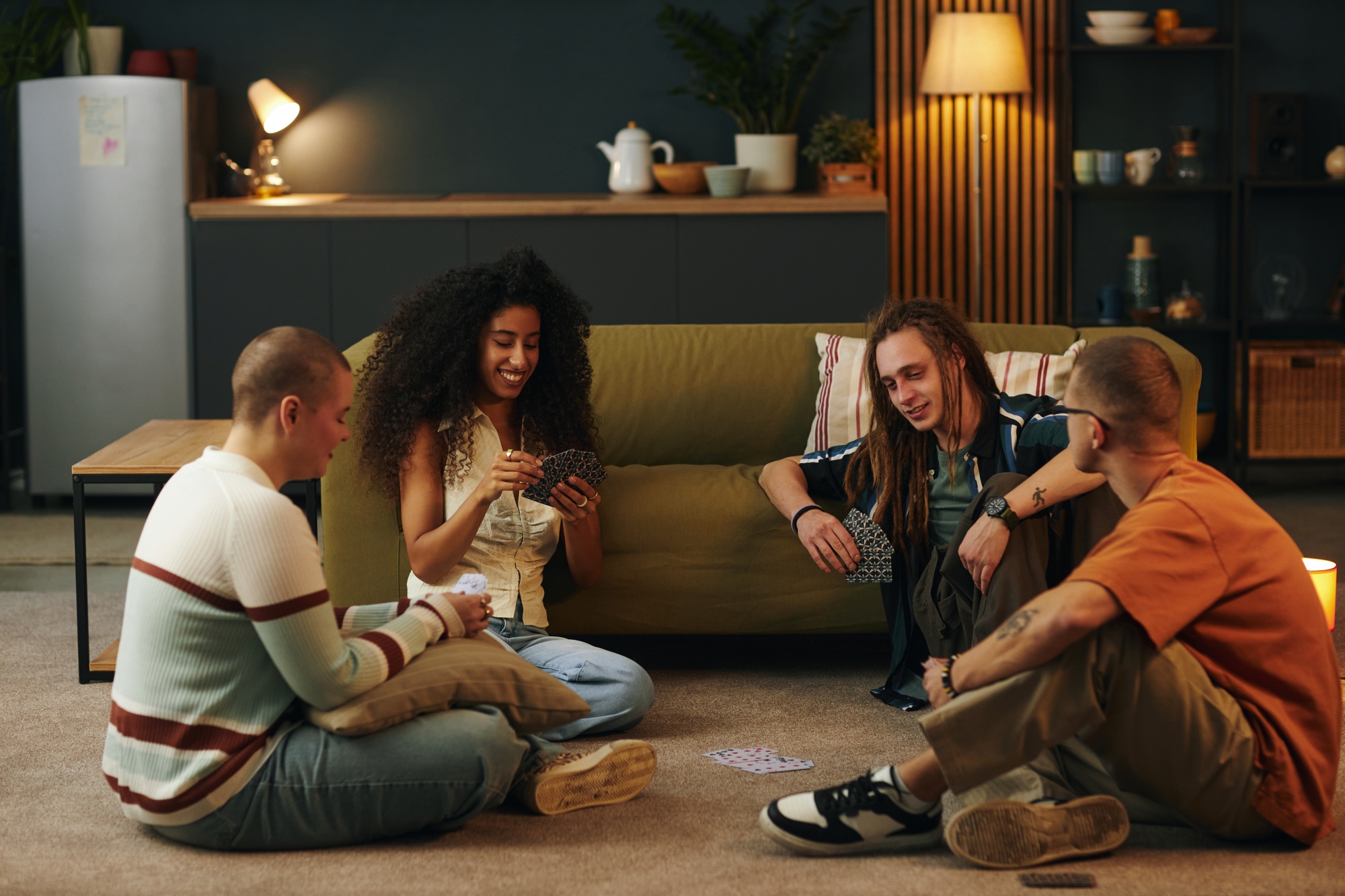 Friends Playing Card Game in Cozy Living Room