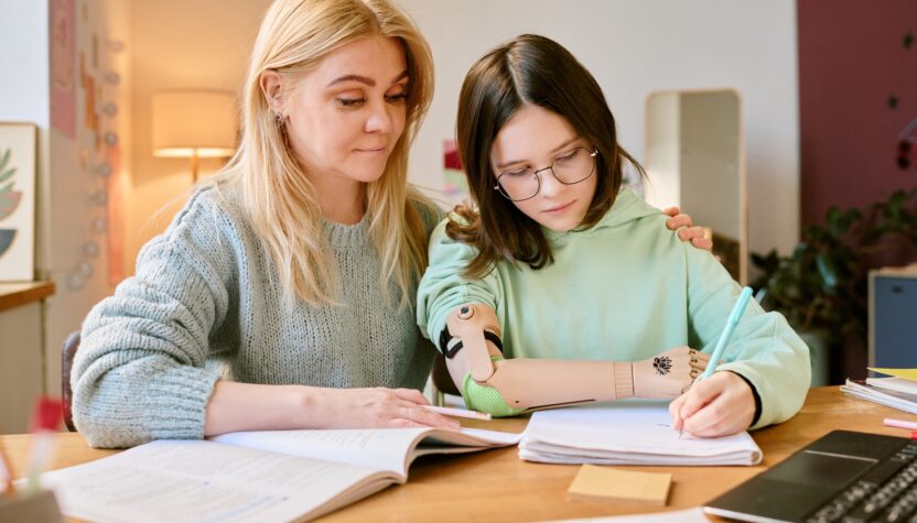 Helping Young Student with Homework at Home