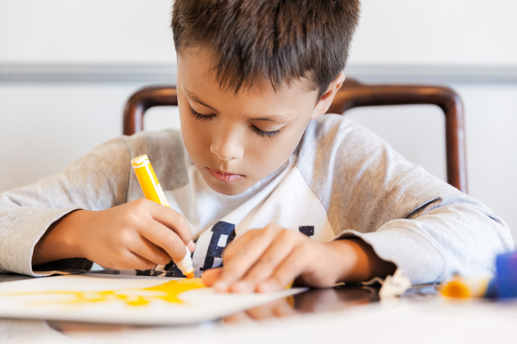 Child drawing on paper
