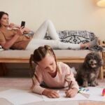 Girl with Dog Drawing Pictures